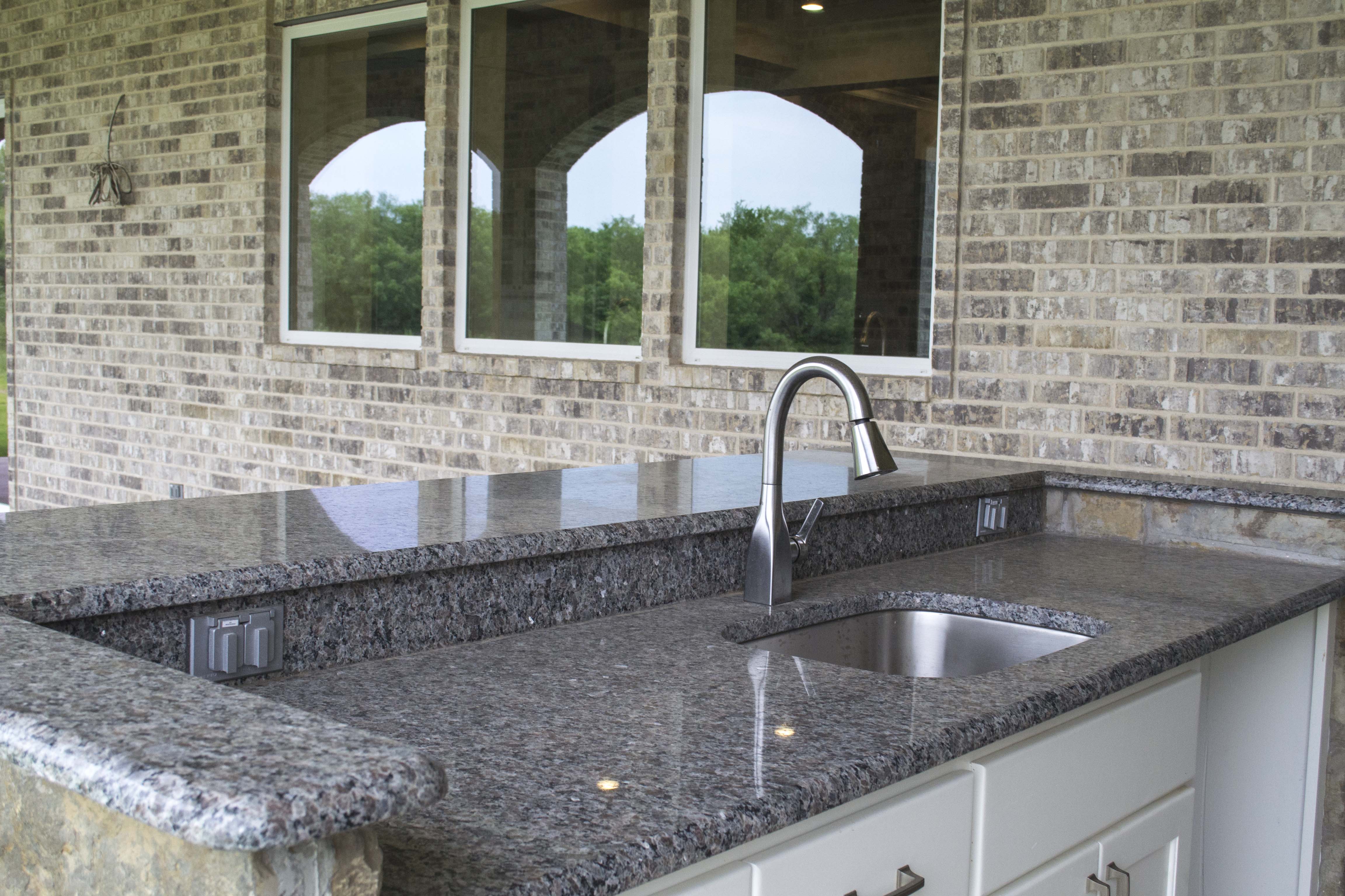 apos_floors_granite_countertops_tile_carpet_kitchens_table_hardwood_bathrooms_texas_alvarado_dallas_fort_worth_fireplace_sink.jpg